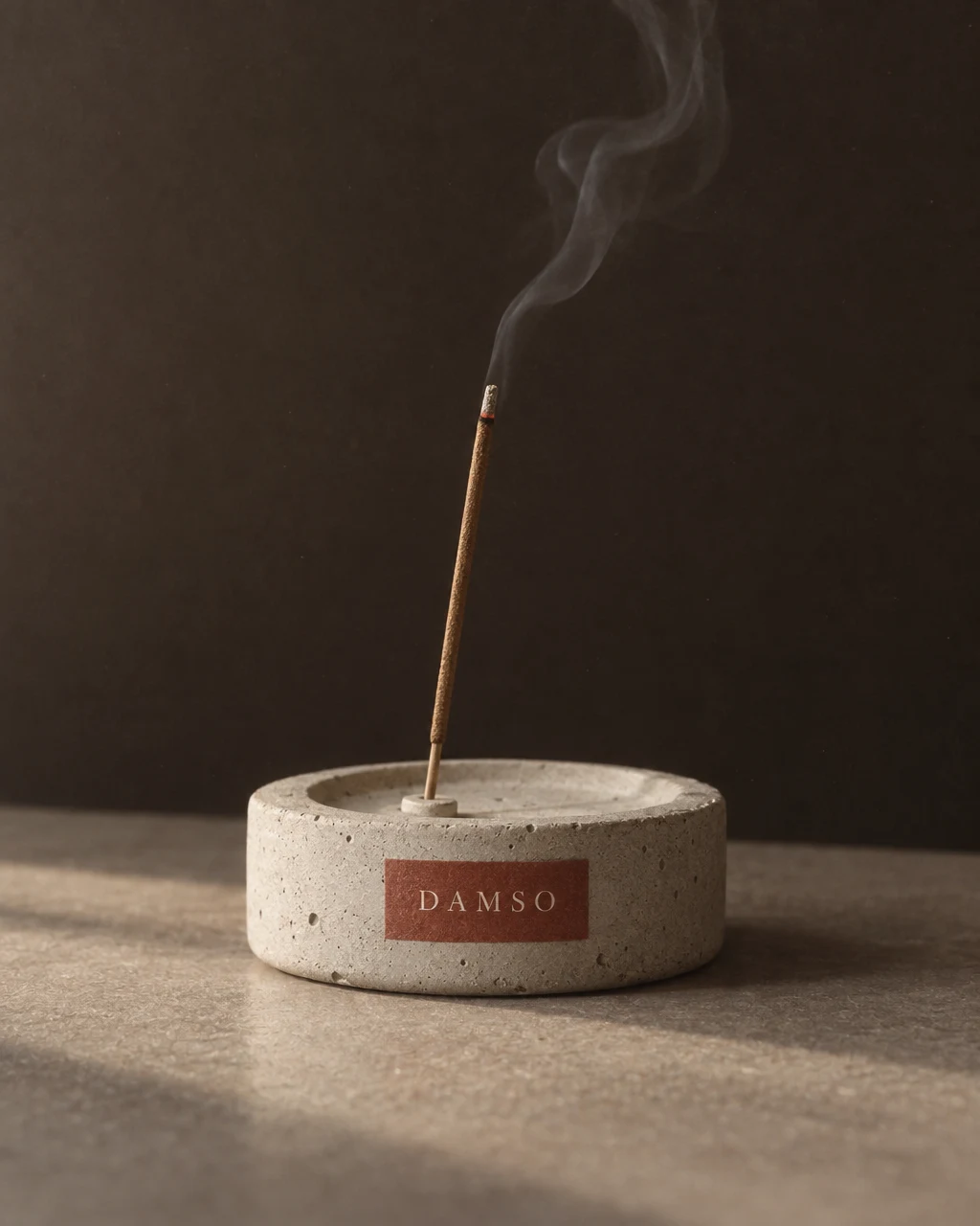 DAMSO incense holder with smoke rising